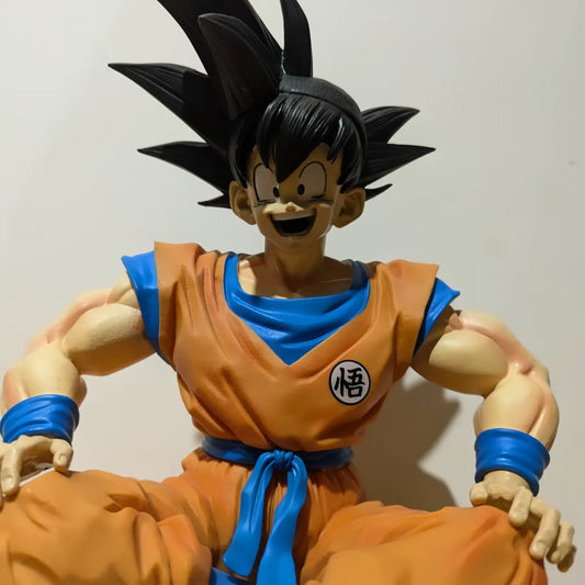 Big Goku sitting on flying nimbus